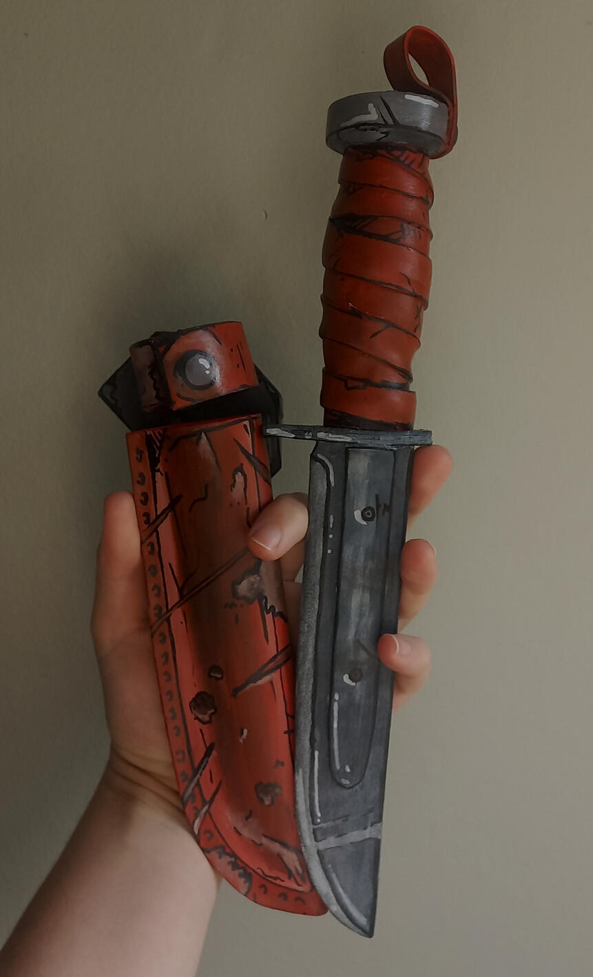 A combat knife I made for a Borderlands cosplay. Years of making those cosplays mean I&#39;ve become quite skilled at the iconic celshaded art style.