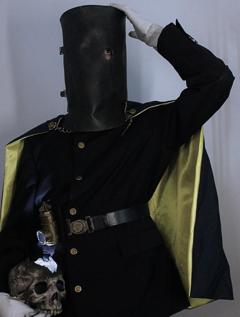 My cosplay of Valtr, Master of the League, from Bloodborne, featuring a madman's knowledge skull prop fashioned from a Halloween decoration.
